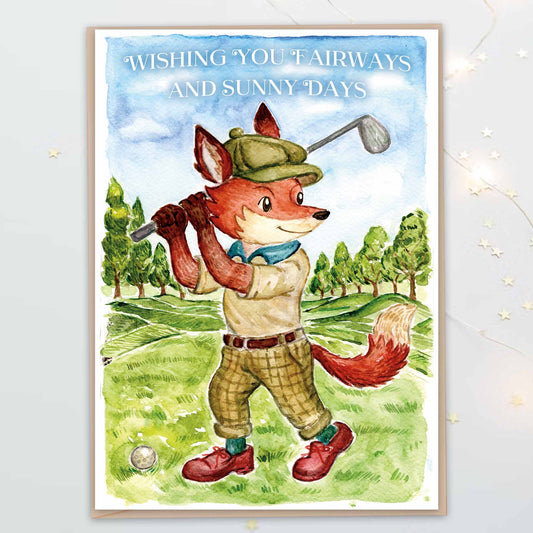 Watercolour illustrated greeting card of a fox playing golf on a scenic golf course with texts "Wishing you fairways and sunny days".