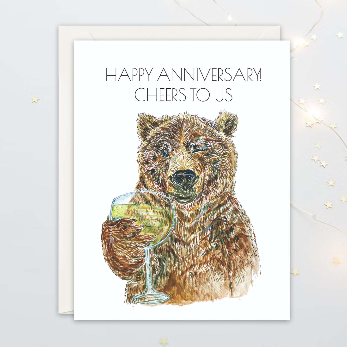 Card with a bear holding a glass of wine and 'Happy Anniversary Cheers to Us' text on a white background.