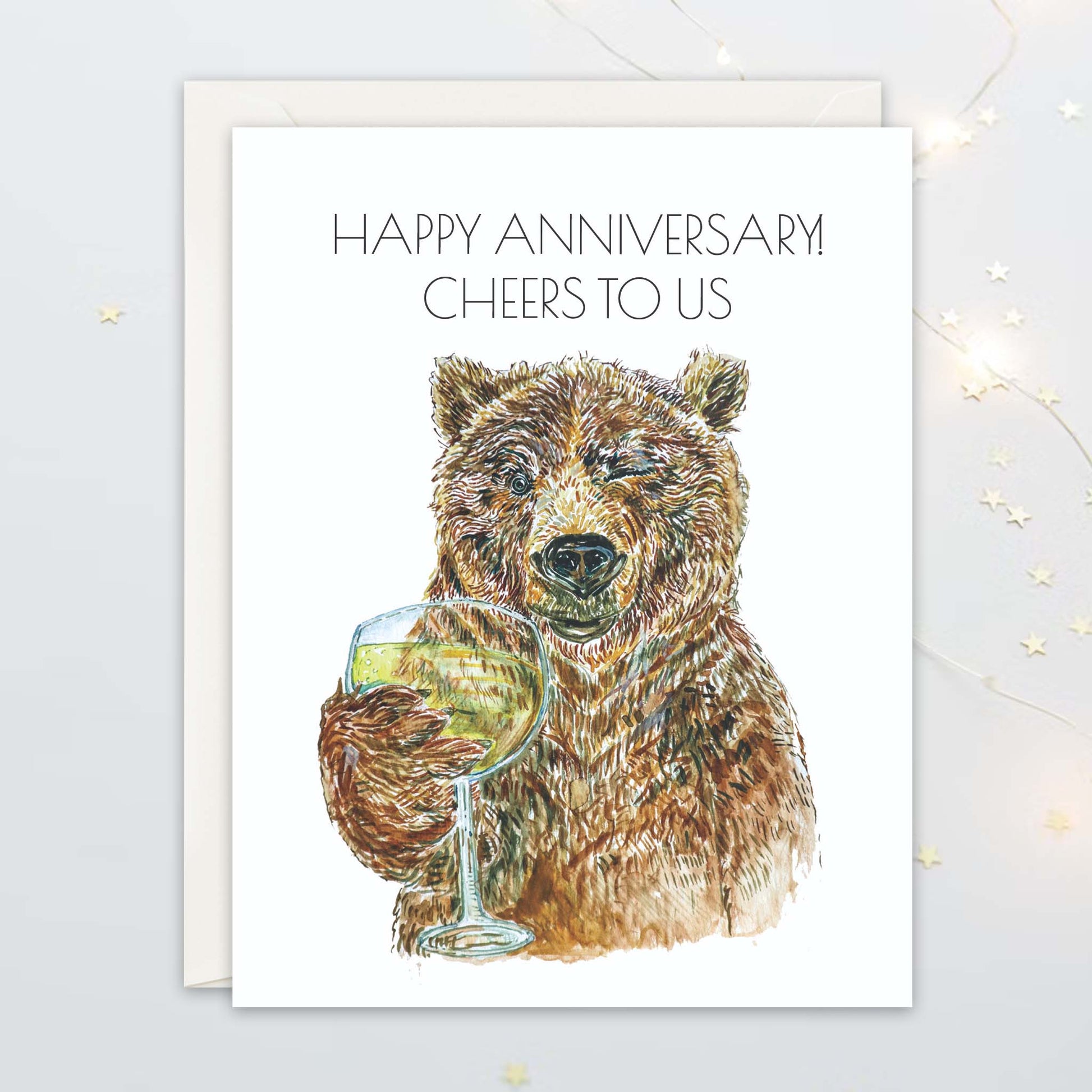 Card with a bear holding a glass of wine and 'Happy Anniversary Cheers to Us' text on a white background.