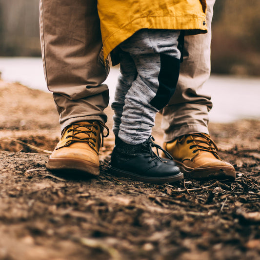 picture of two sets of shoes with father and son steps