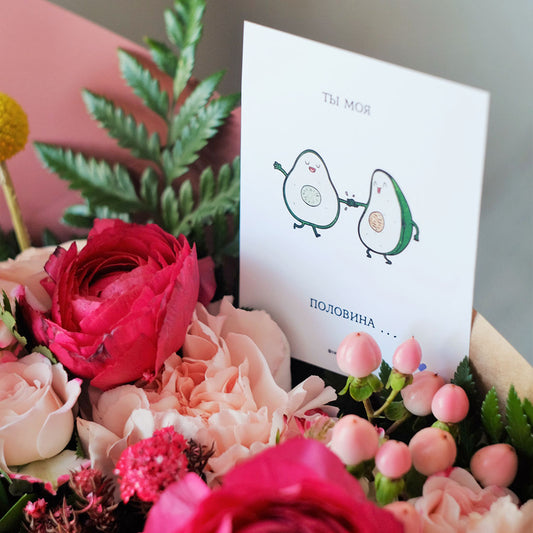 Image of an avocado greeting card and a bouquet of flowers