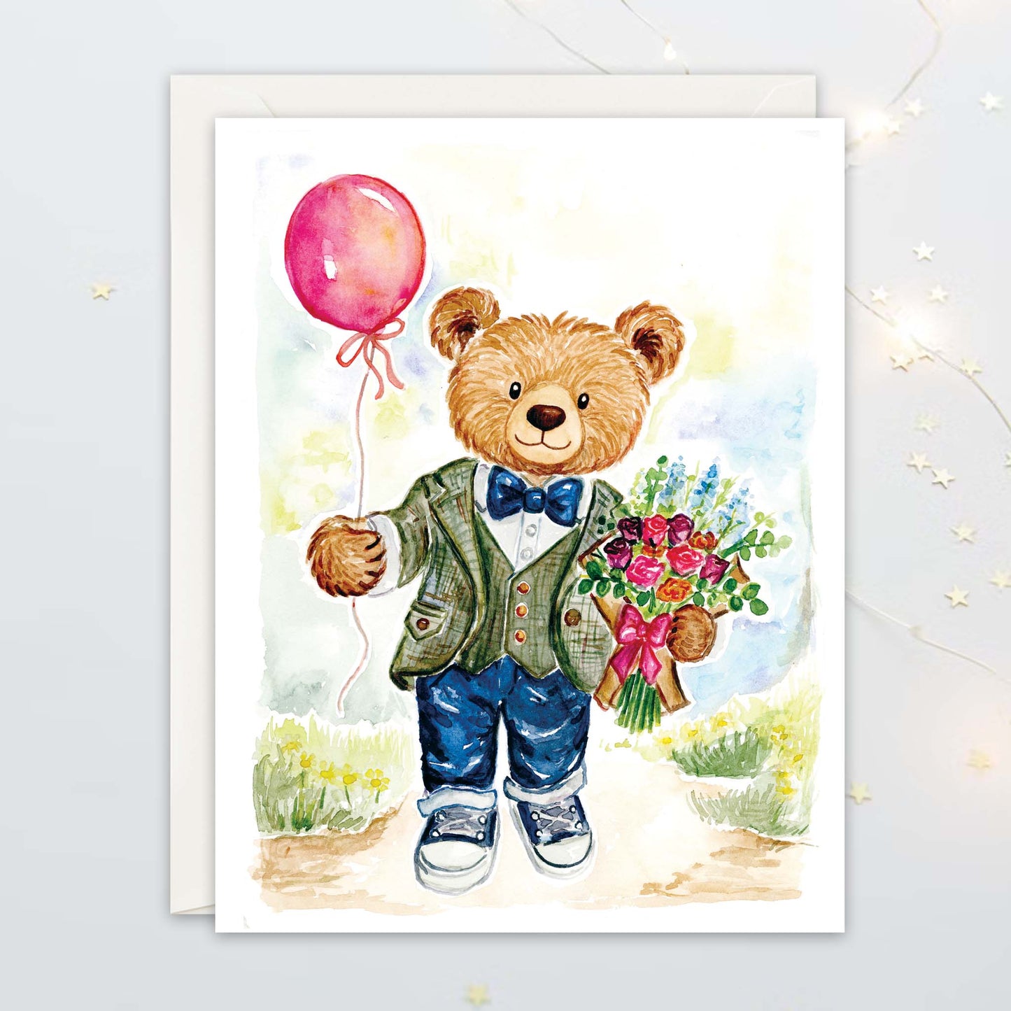 A2 size greeting card illustration of a teddy bear in a suit holding a red balloon and flowers on a white background.