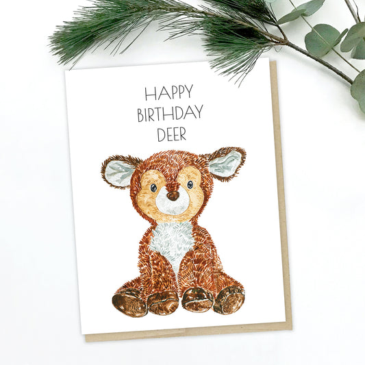 A greeting card of a baby reindeer with big ears. The text reads: Happy Birthday "Deer"